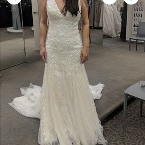 Oleg Cassiri wedding dress retailed over 1K